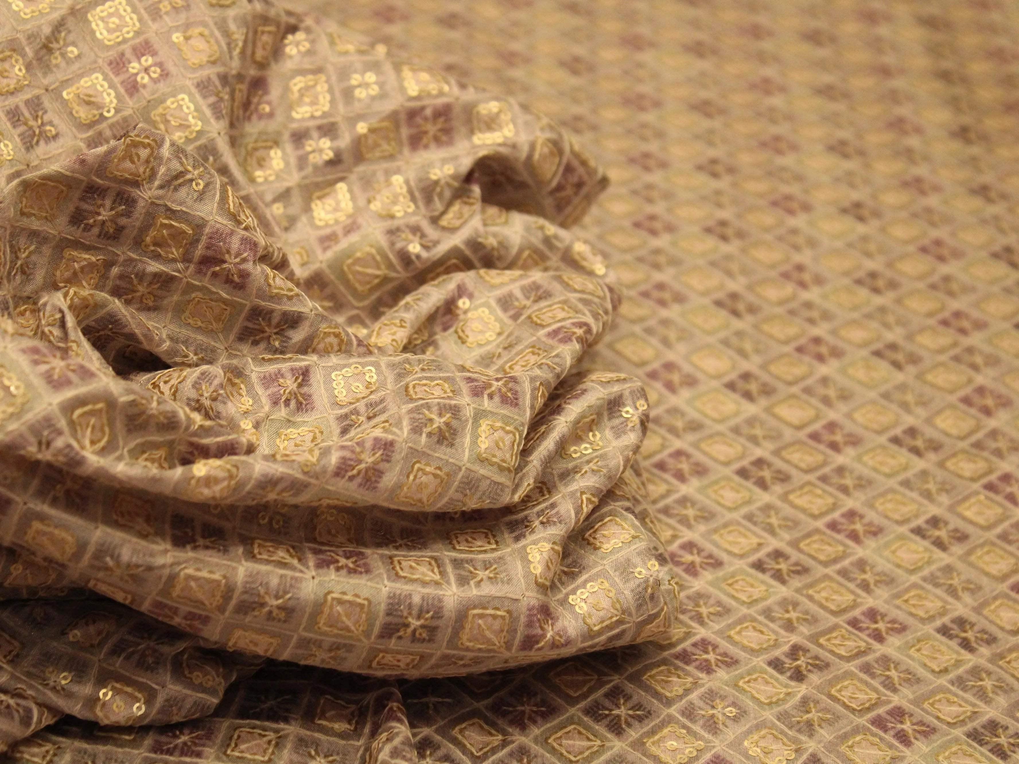 Banarasi brocade fabric with gold and purple geometric pattern and sequin detailing