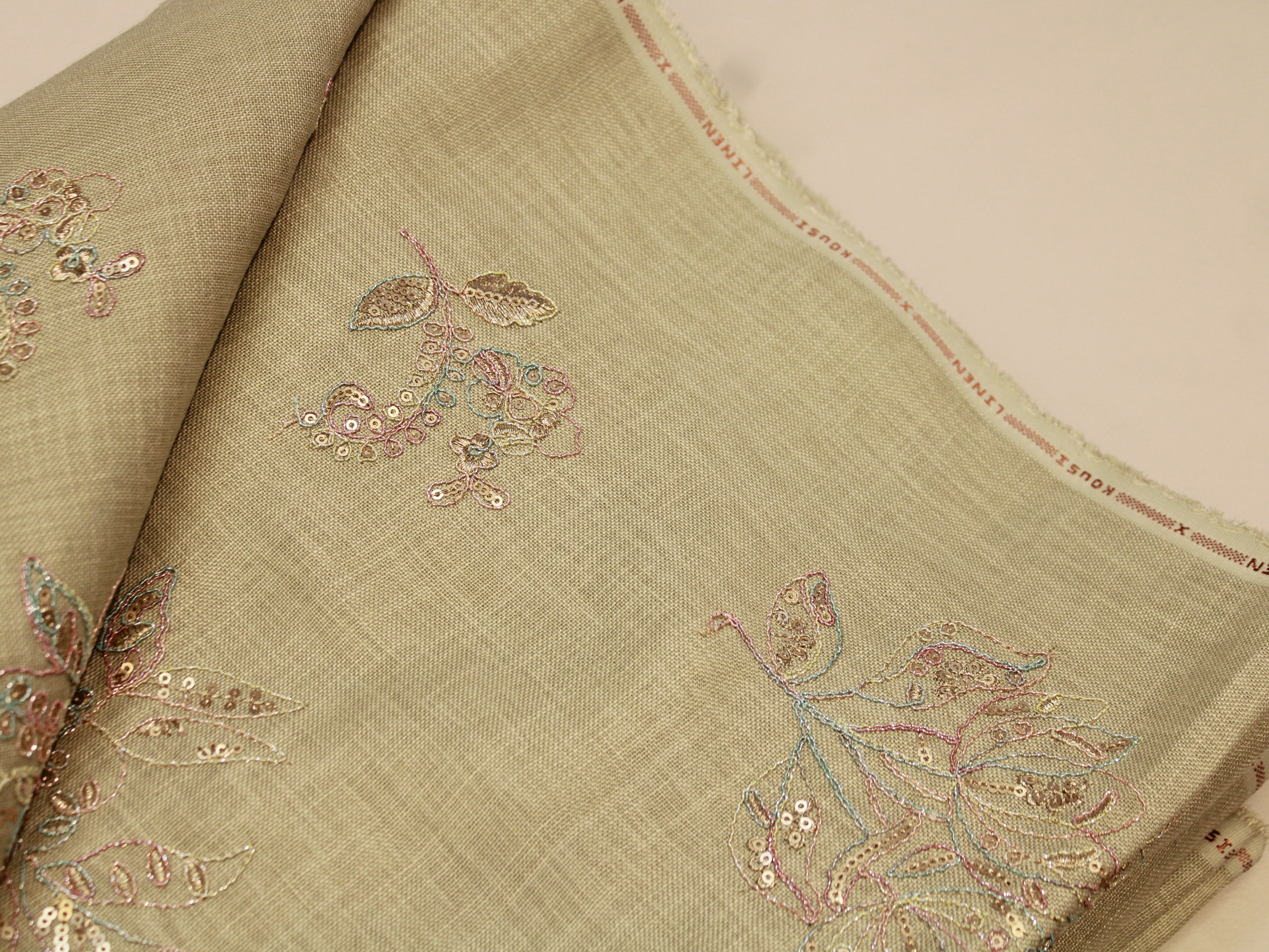 Cotton Linen Texture Fabric with Zari & Thread Embroidery - Pista Green