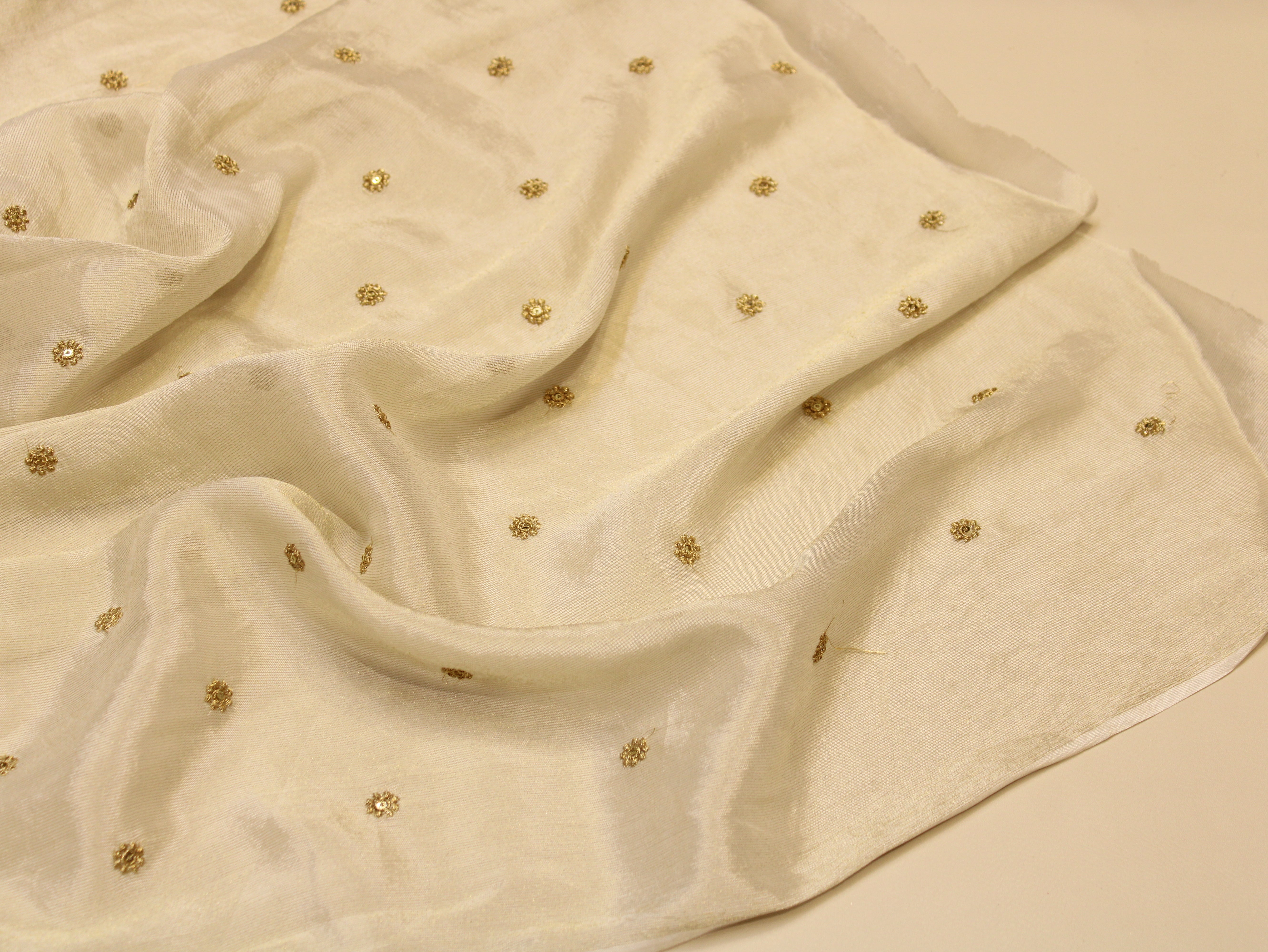Chinon Tissue Fabric — Ivory Dyeable | Allover Gold Zari Rosette Butti