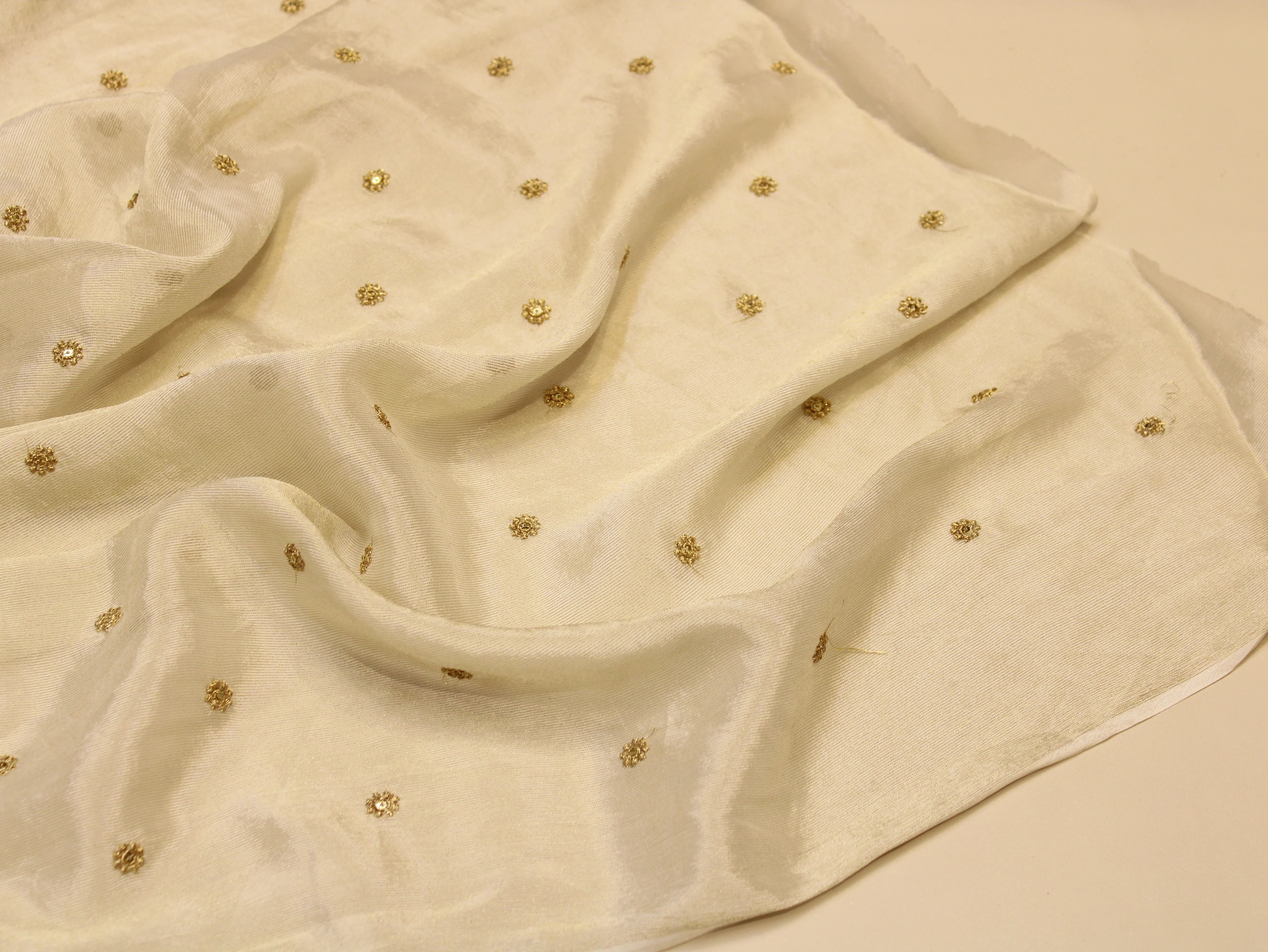 Chinon Tissue Fabric — Ivory Dyeable | Allover Gold Zari Rosette Butti