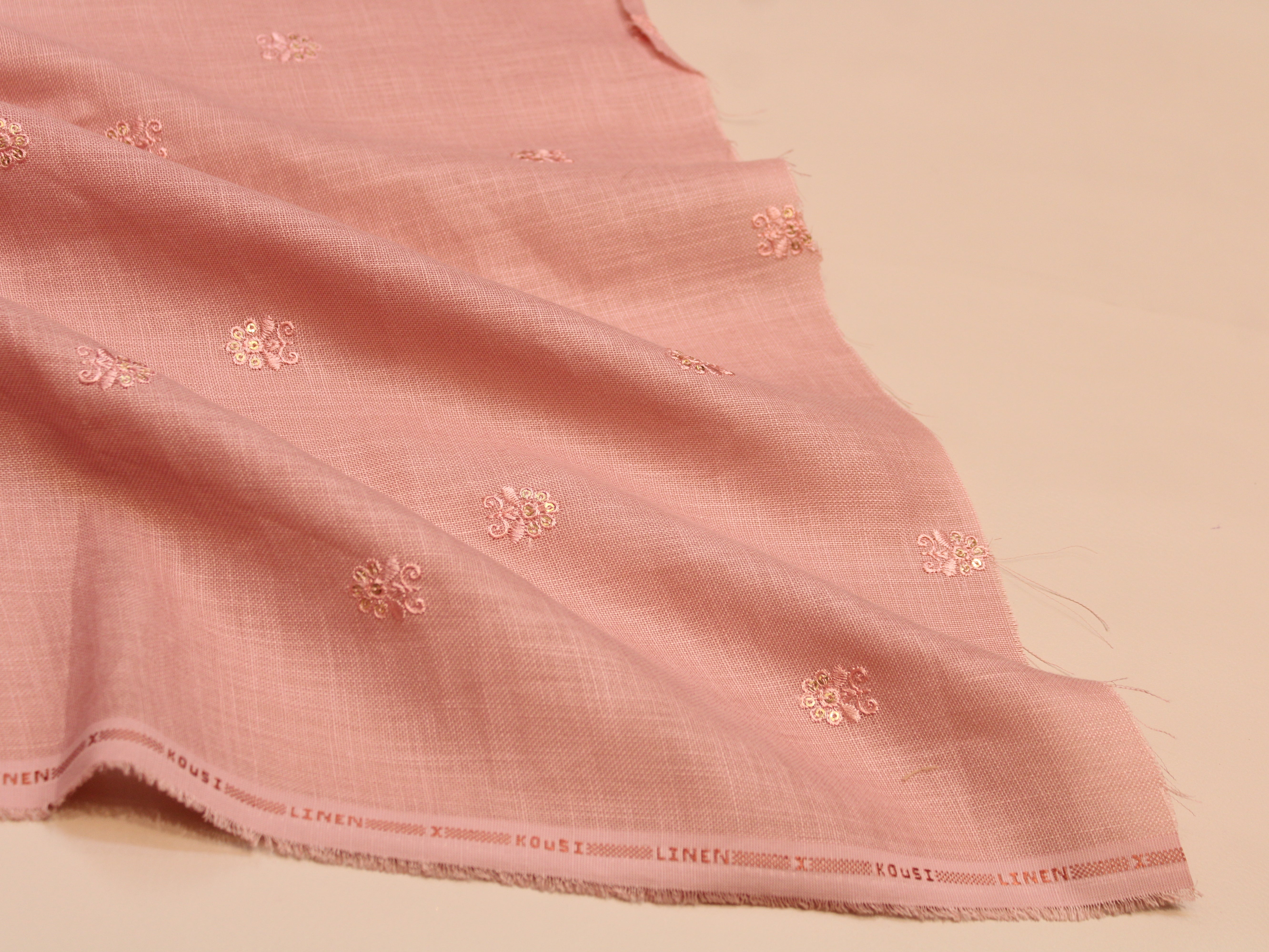 Cotton Linen Texture Fabric with Zari & Thread Motifs Embroidery - Pastel Peach