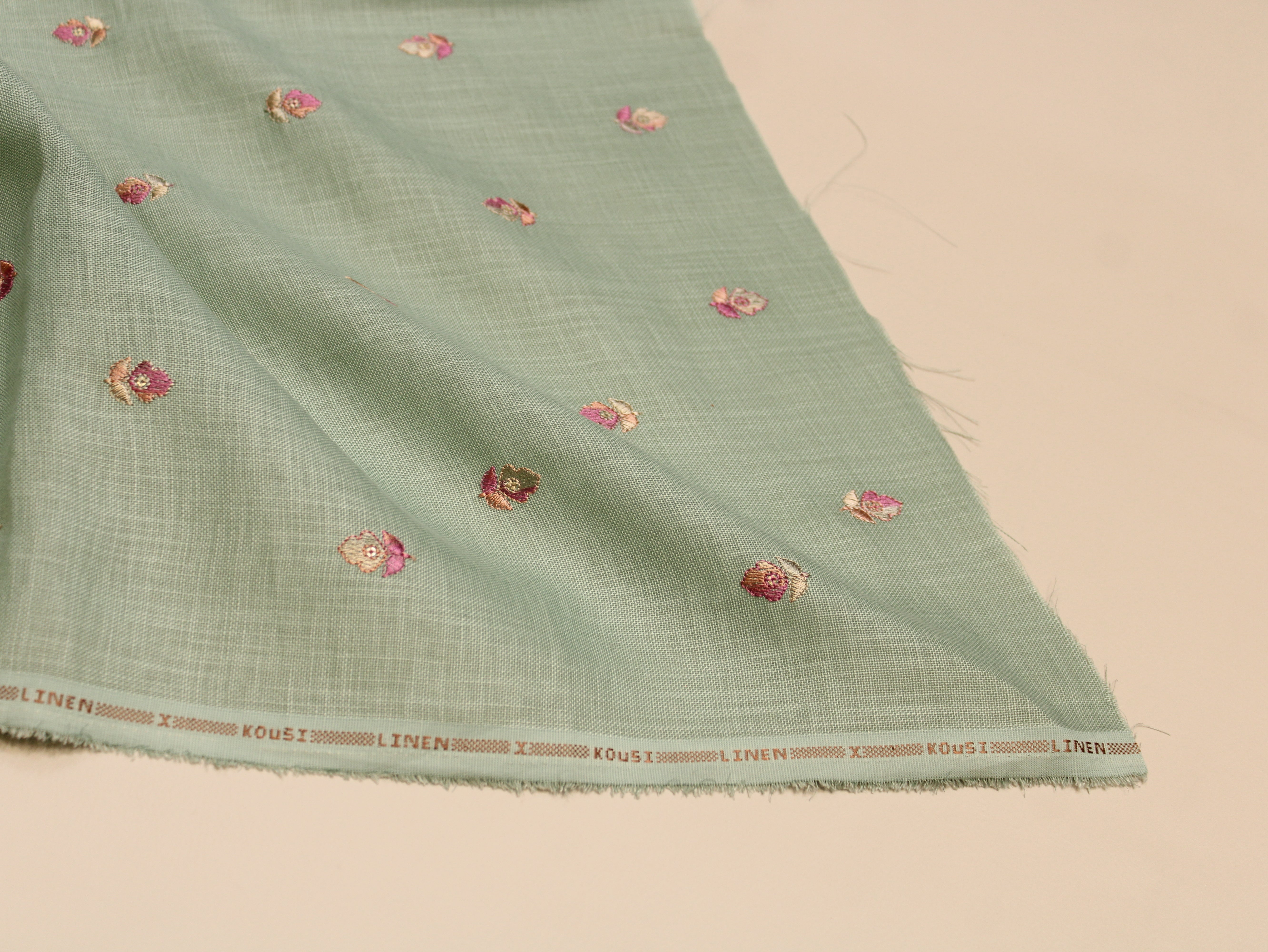 Cotton Linen Texture Fabric with Zari & Thread Motifs Embroidery - Sea Green