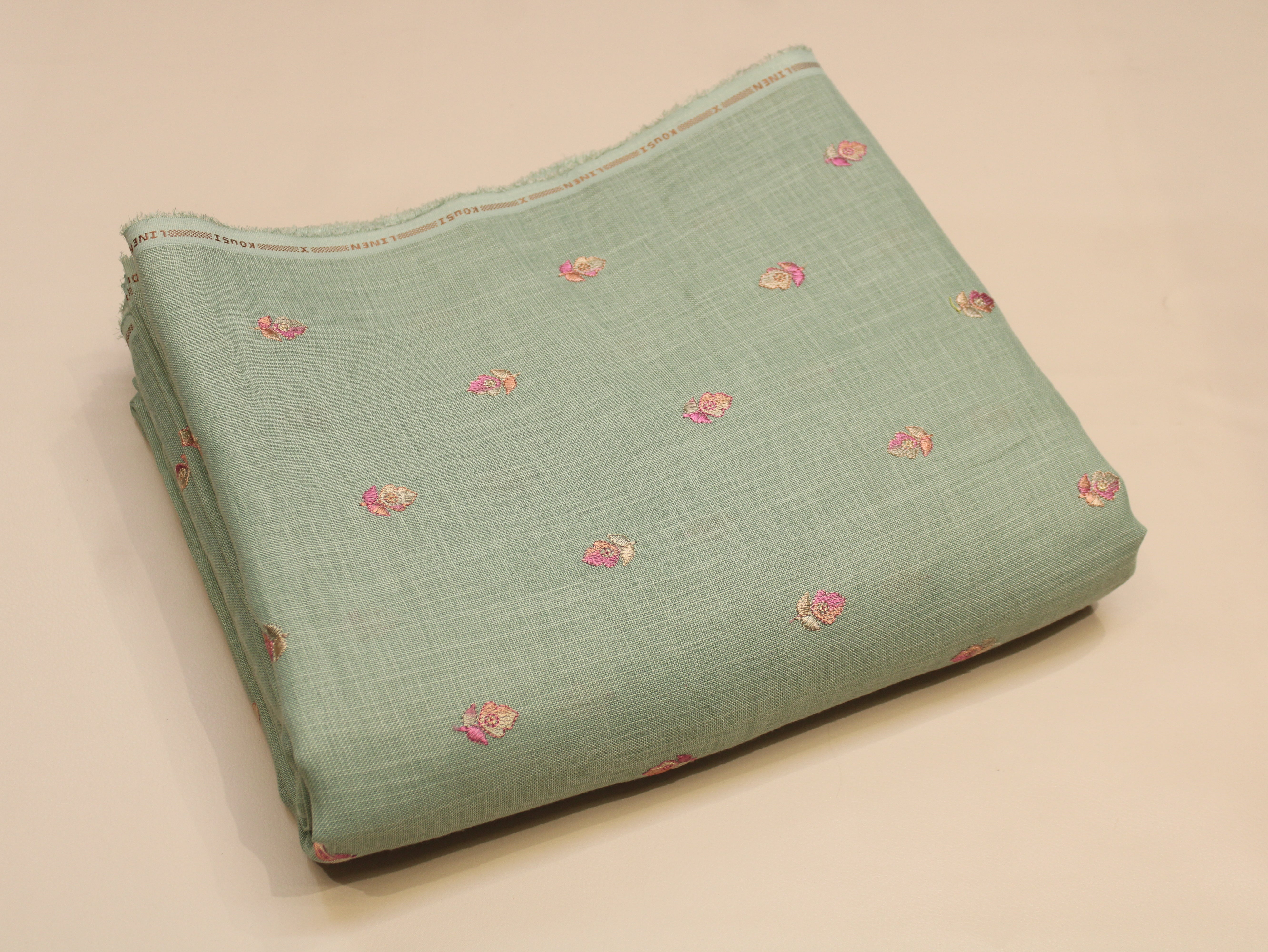 Cotton Linen Texture Fabric with Zari & Thread Motifs Embroidery - Sea Green