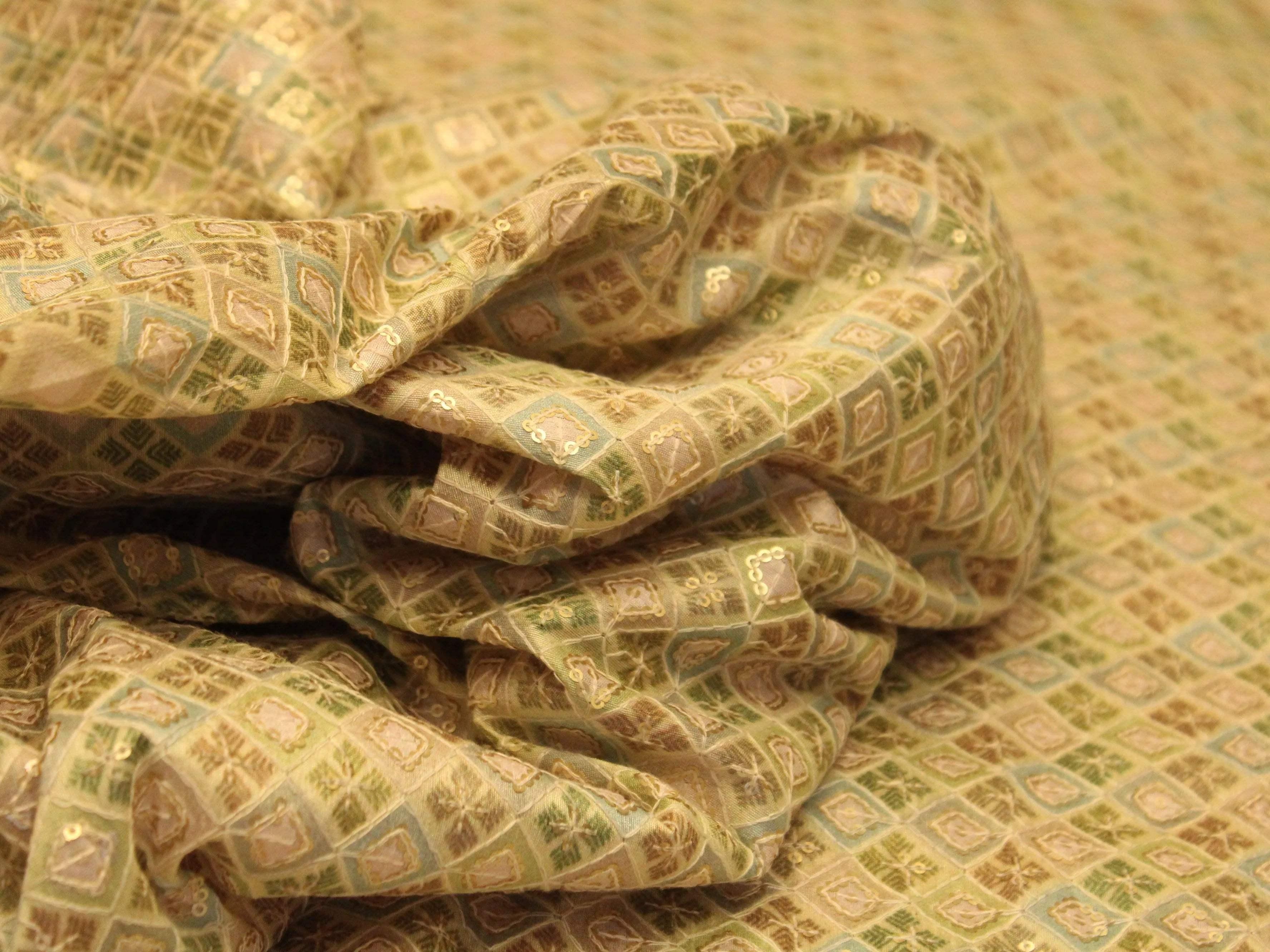 Pista green silk digital print fabric with geometric gold sequin design, close-up view