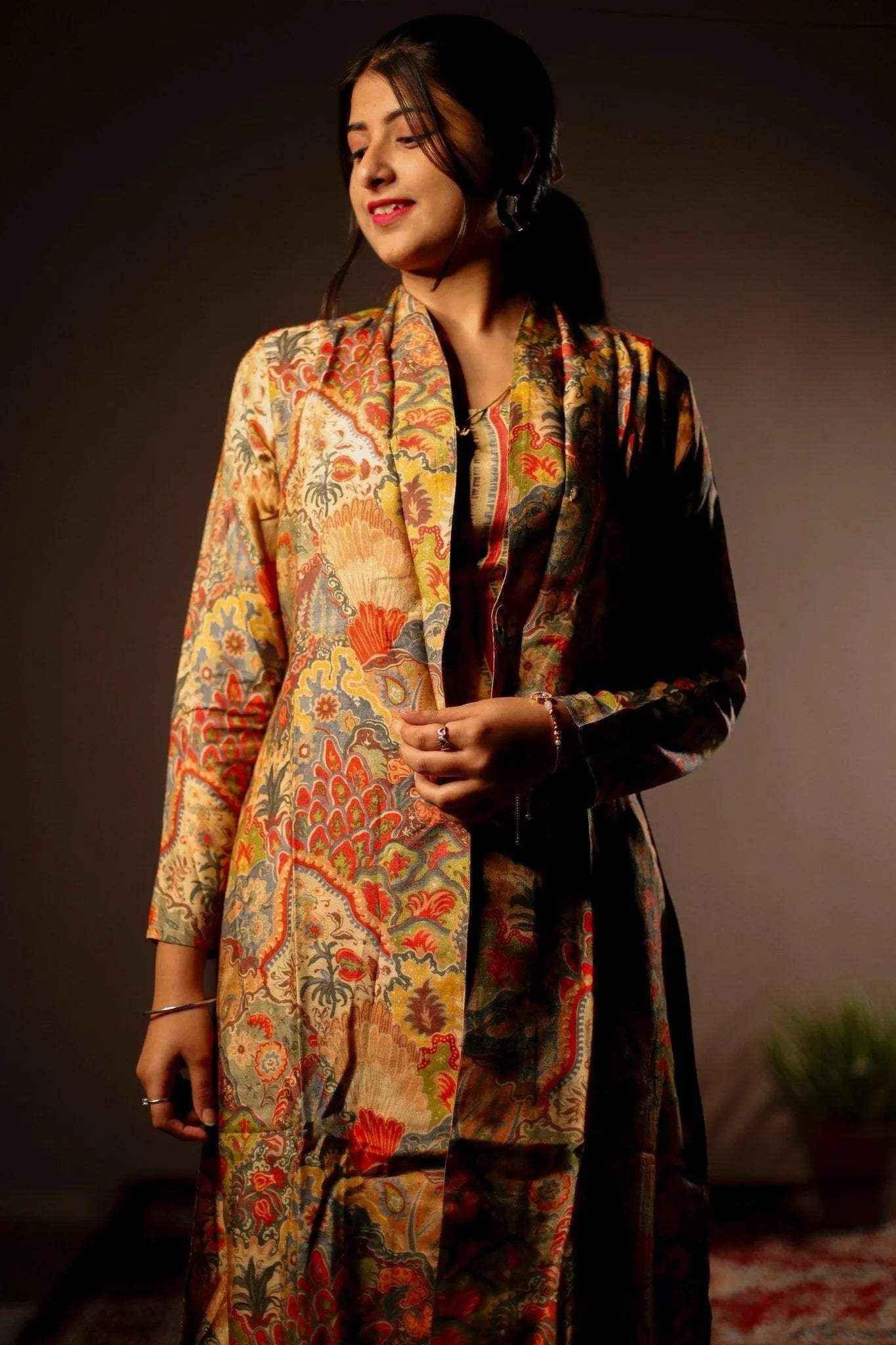Woman wearing a floral printed blazer and pants co-ord set, traditional Indian fabric