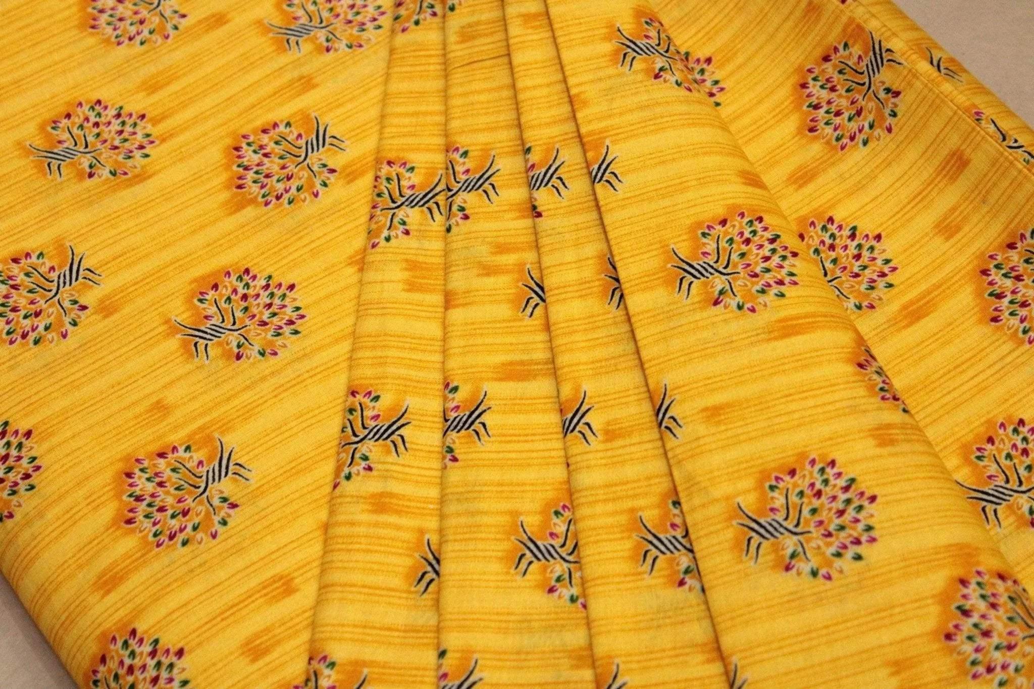 Yellow cotton fabric with buti screen print and multicolor floral motifs