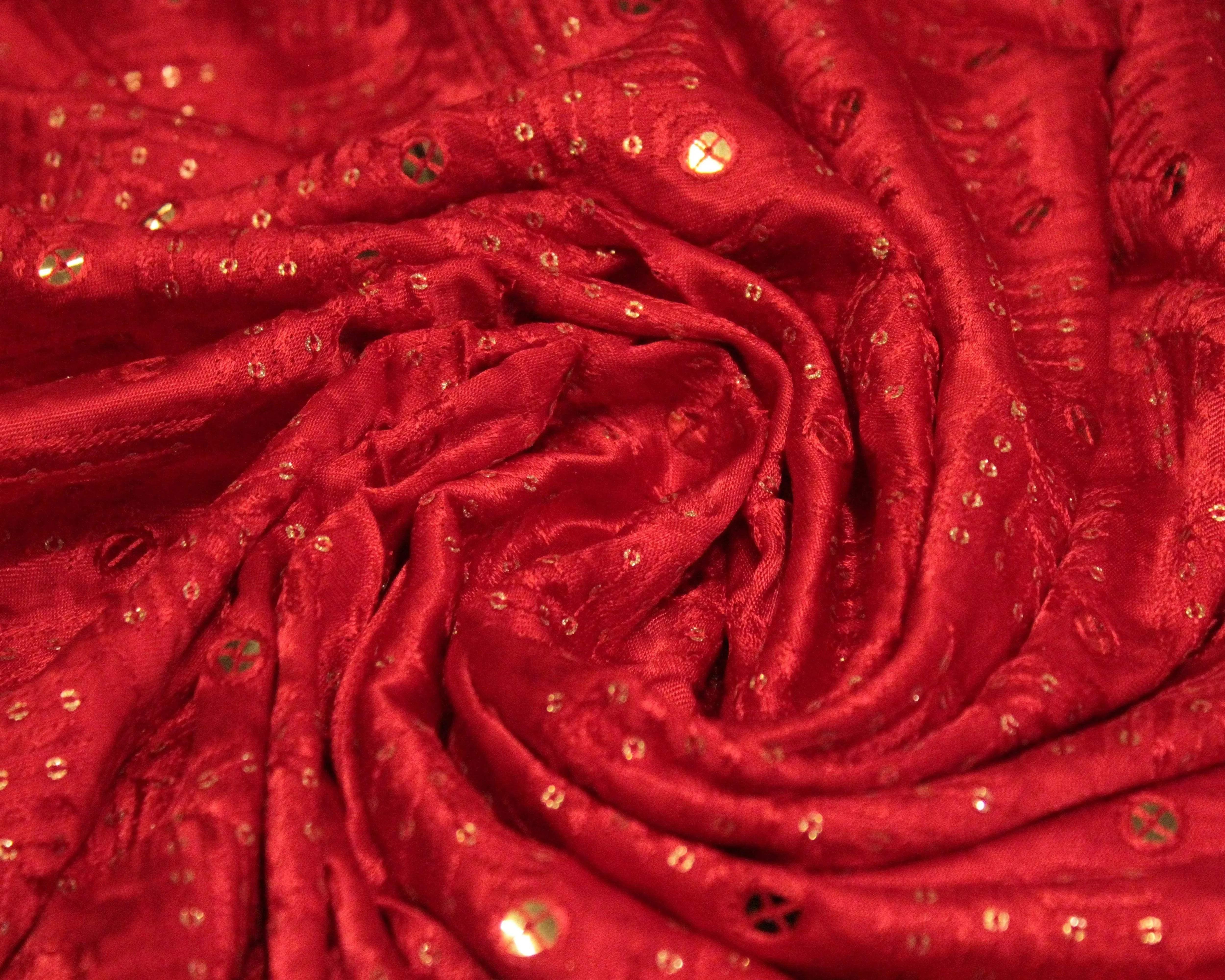 Red Gaji silk fabric with thread and mirror work, traditional Indian textile
