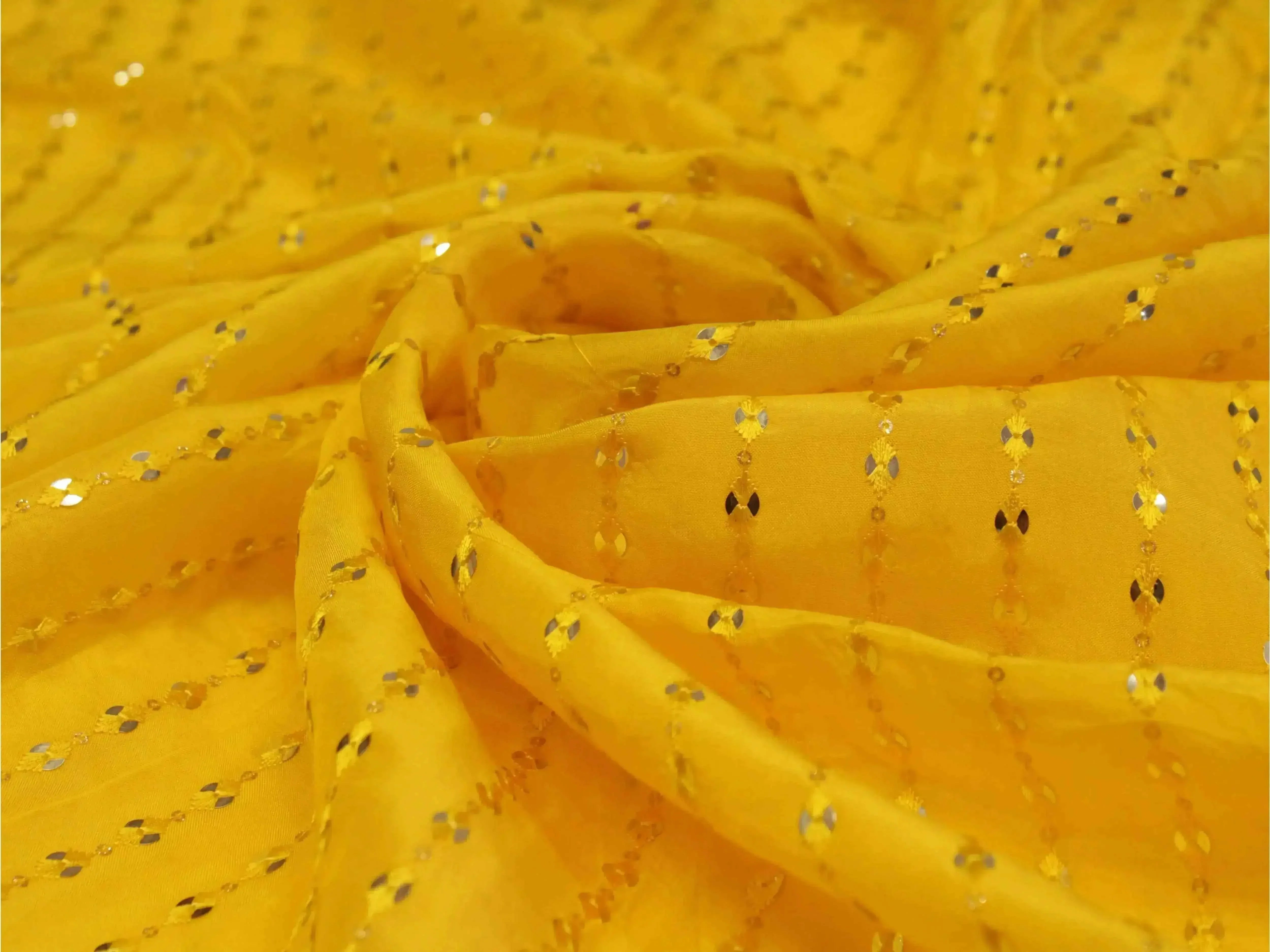 Yellow mirror work fabric with sequin embroidery, ideal for Indian ethnic outfits
