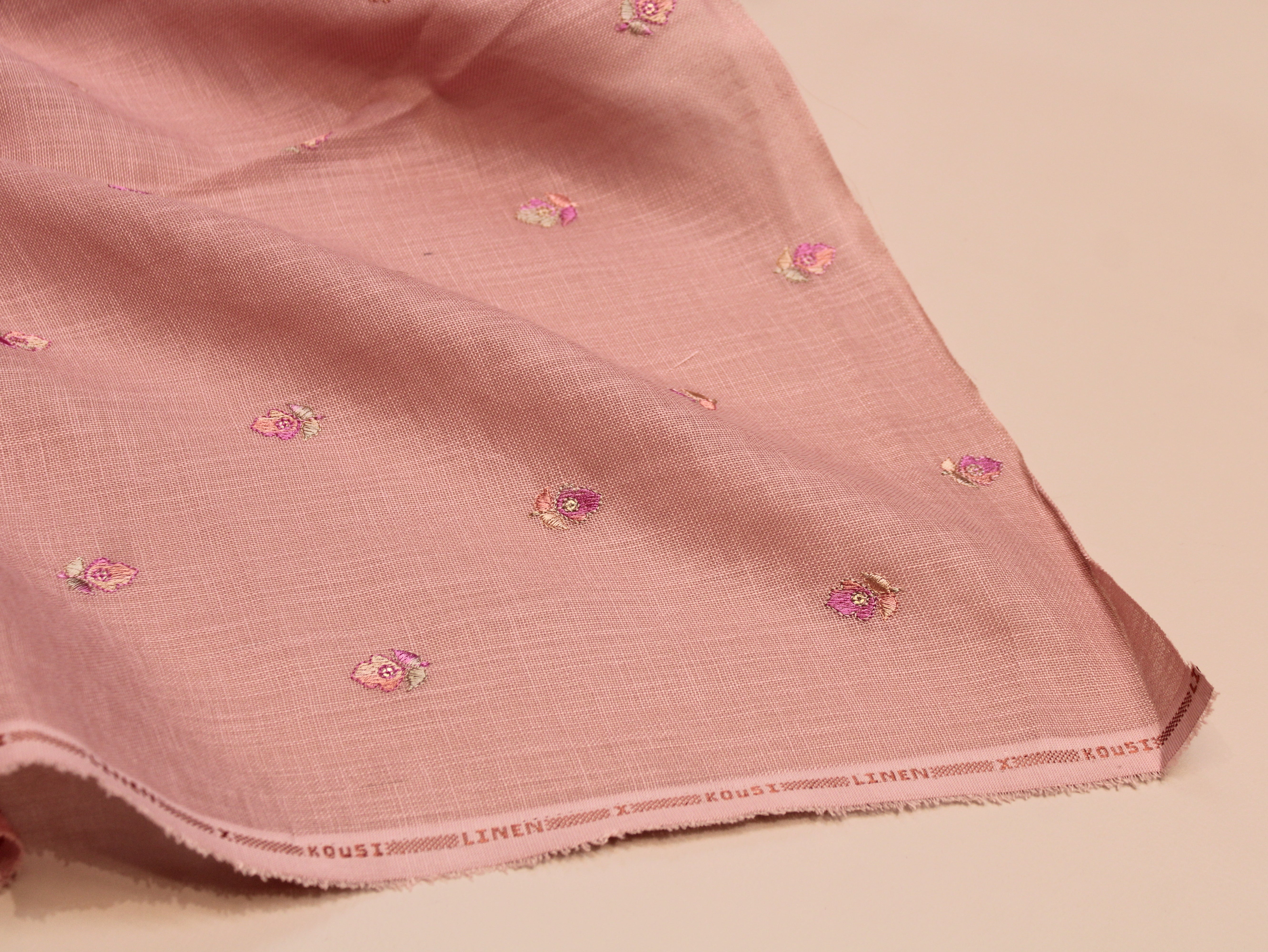 Cotton Linen Texture Fabric with Zari & Thread Motifs Embroidery - Peach